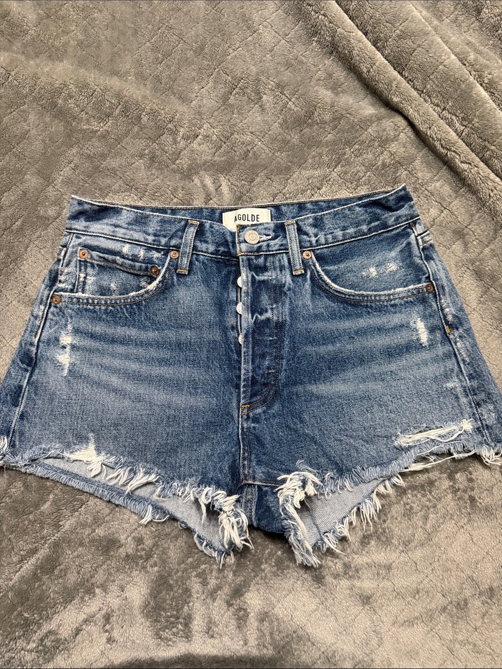 Agolde Distressed High-Rise Jean Shorts in Faded Blue